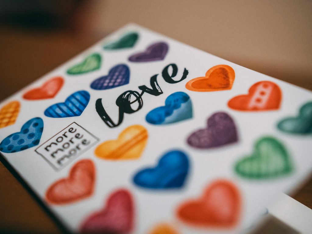 Colorful heart design with 'love' text, perfect for romantic themes and creative projects.