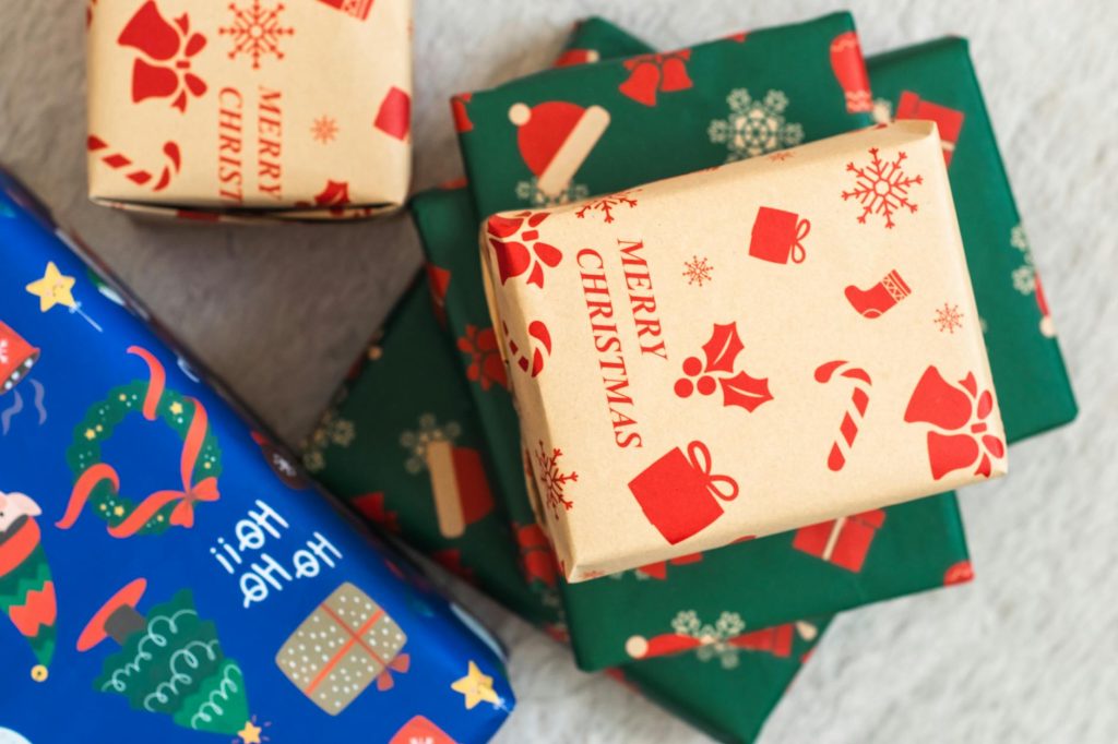 Colorful Christmas gifts wrapped with festive paper. Perfect for holiday themes.