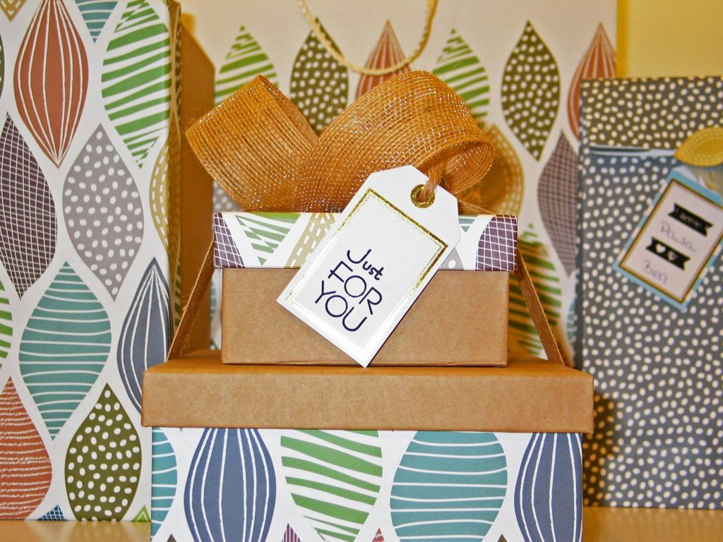Beautifully wrapped gift boxes with a bow and 'Just For You' tag, perfect for celebrations.